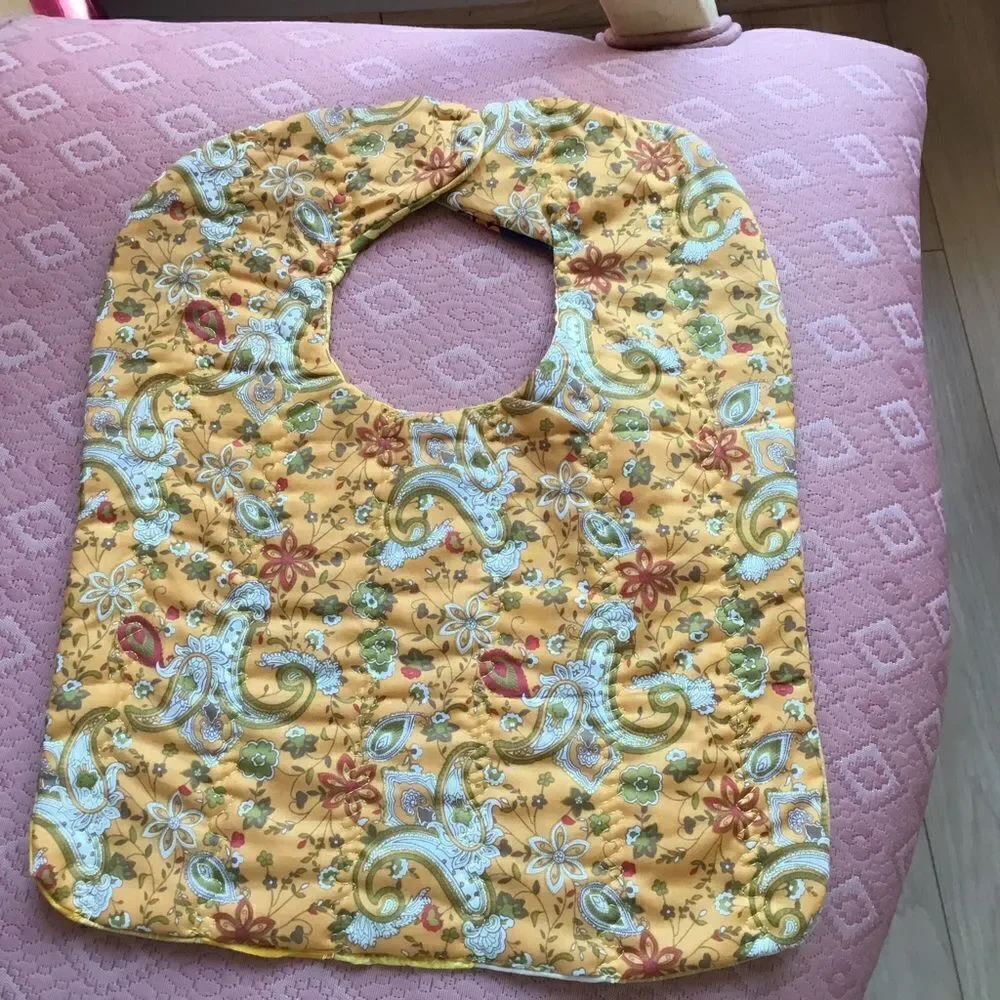 3/$25 or $12 each.  Hand Crafted, Quilted Yellow Reversible Baby Bib